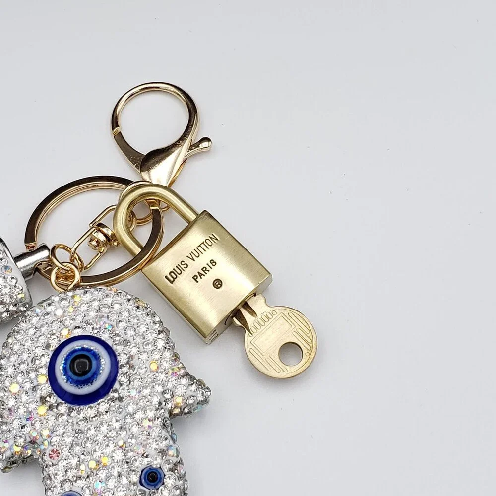 Louis Vuitton Gold Lock 🔒 Authentic LV Key + Unbranded Evil Eye Bag Charm - Picture 6 of 9